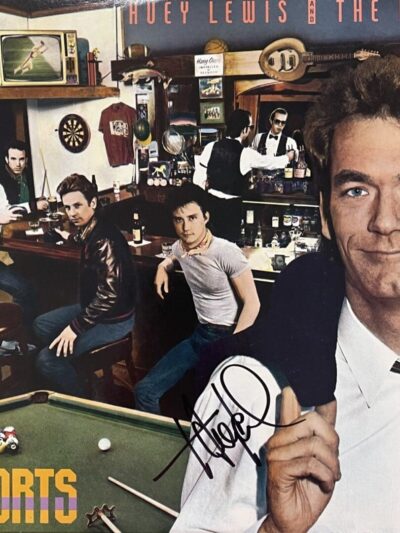 "Huey Lewis and The News Autographed Album