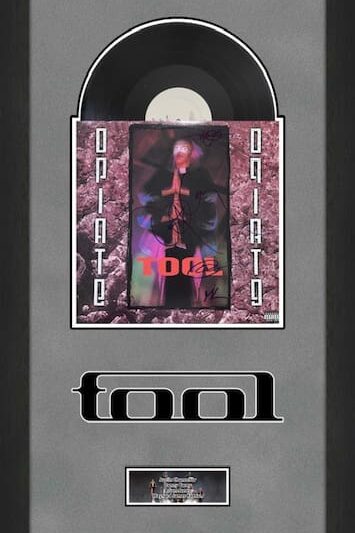 "Tool" Band Autographed Album